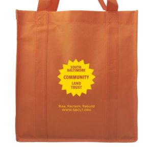 Orange tote bag with yellow SBCLT logo